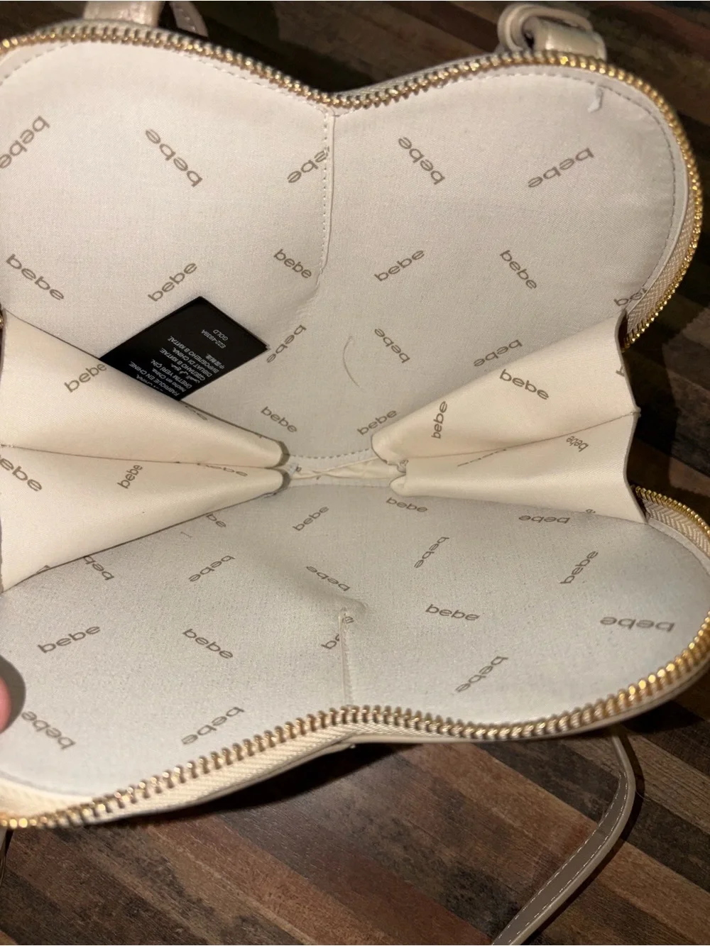 bebe Metallic Champagne Heart Crossbody Bag with Gold Logo
